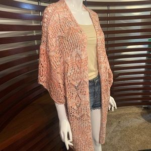 Hem and thread knitted cardigan